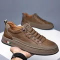 Men's casual brown leather loafers with side striped ribbon and thick soft soles - EU 38 / Brown