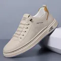 Sneakers beige stringate da uomo con suole spesse e dettagli sul tallone in pelle marrone - EU 38 / Fodera Singola / Beige