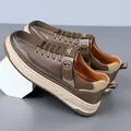 Men's dark brown textured leather platform casual shoes with gold metal wing logo - EU 38 / Khaki