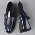 Macro detail of dark blue patent leather loafers with embossed texture and metal buckle - EU 38 / Blue