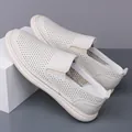 Men's cream-white hollow loafers featuring breathable perforated leather and slip-on style - Off-White Perforated