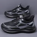 Scarpe da corsa da uomo in mesh nero e grigio con scritte sportive alla moda - EU 38 / Scarpe Basse / Nero