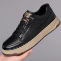 Retro black leather sneakers for men with thick beige soles and vintage label detail - EU 38 / Black