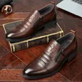 Men's dark brown pointed leather dress shoes with lion head emblem and side zipper detail - EU 38 / Brown Single Shoes