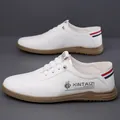 Men's white casual leather loafers with non-slip brown rubber sole and tricolor ribbon detail - EU 38 / White