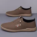 Brown men's casual leather shoes with XINTAIZI embroidery and anti-slip rubber sole - Brown Unlined (6881)
