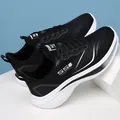 Black and white breathable mesh sneakers for men featuring a thick white cushioned sole - EU 38 / Black Mesh