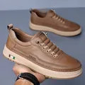 Braune Leder-Freizeitschuhe für Herren mit dicker Gummisohle und Markenlogo-Detail - EU 38 / Braun