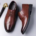 Classic brown leather wingtip brogue oxfords for men with elegant perforated details - EU 38 / Brown