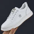 Men's white casual leather sneakers with fashion logo and brown rubber sole - EU 38 / White