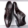Men's burgundy patent leather brogue oxford shoes with decorative monk strap and wingtip details - EU 38 / Brown