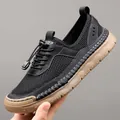 Herren Mesh-Freizeitschuhe in Schwarz und Braun mit elastischem Schnürsystem - EU 38 / Schwarz