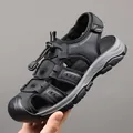 Outdoor sandals in black and gray colorway with closed-toe design and adjustable strap - EU 38 / Black