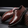 Brown leather brogue derby shoes for men with classic wingtip carved details - EU 38 / Brown