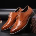 Classic caramel brown leather brogue shoes with wingtip detailing and lace-up closure - EU 38 / Yellow