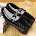 Glossy black patent leather men's loafers with a decorative metal V buckle detail - EU 38 / Black Solid Shoes