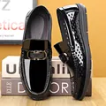 Men's glossy black patent leather loafers with hollow vents and metal V buckle detail - EU 38 / Black Hollow