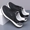 Baskets en maille respirante pour hommes en noir et blanc avec semelles souples - EU 38 / Maille Noire