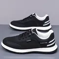 Men's breathable mesh running sneakers in classic black and white colorway - EU 38 / Black Mesh