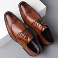 Brown leather brogue shoes with classic wingtip decorative perforations and lace-up design - EU 38 / Brown