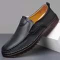 Men's black leather slip-on loafers with sport engraving and non-slip rubber soles - EU 38 / Black