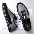 Men's casual leather slip-on shoes in grey textured finish with adjustable buckle - EU 38 / Gray