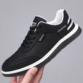 Men's breathable black sports sneakers with white soles and trendy perforated mesh detail - EU 38 / Black Leather