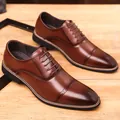 Classic brown brogue derby shoes with cap toe detail and polished leather finish - EU 38 / Brown