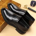 Classic black leather loafers for men with textured pattern and polished business finish - EU 38 / Black