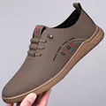 Men's slip-on casual brown leather shoes with anti-slip rubber sole and side CXGK detail - EU 38 / Brown Single Shoes