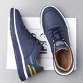 Navy blue men's sneakers with yellow stripes and perforated breathable faux leather - EU 38 / Blue Leather