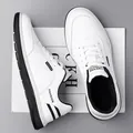 Men's white fashion casual sneaker with black rubber sole and breathable synthetic leather - EU 38 / White Leather
