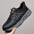 Men's breathable black and grey slip-on sneakers with synthetic leather and mesh details - EU 38 / Black