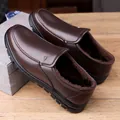 Men's dark brown slip-on leather shoes with warm fur lining and non-slip rubber soles - EU 38 / Fleece Lined / Brown