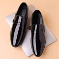 Men's black patent leather monk strap shoes with silver buckle on a laptop background - EU 38 / Black
