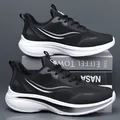 Black and white mesh sports running shoes with thick cushioned soles and lace-up design - EU 38 / Black White Leather Surface
