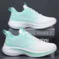 Lightweight mint green running shoes with thick cushioned soles and breathable mesh - EU 38 / White and Blue