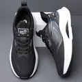 Men's black waterproof running shoes with white thick sole and blue accents - EU 38 / Black Leather