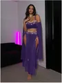 Dettaglio di lingerie esotica viola con frange di paillettes e gonna in rete spaccata - S / Viola