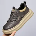 Men's retro low-top sneakers in dark brown leather with thick soles and lace-up design - EU 38 / Gray