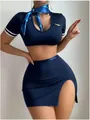 Detail of navy blue flight attendant lingerie set with gold wing badge and striped scarf - S / Dark Blue
