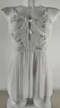 Gros plan sur babydoll en mesh blanc avec broderies florales et détails dentelle - S / Blanc