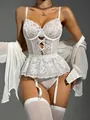 Detail of white lace lingerie set with crisscross straps and sheer stockings - S / White