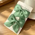 Set of two green satin bow hair clips for kids on jewelry display card - Satin Bow / 2 Pcs/Set / Light Green