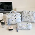 Three-piece light blue floral quilted makeup bag set with cute puppy patterns - Dog