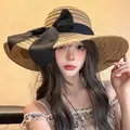 Summer wide brim straw hat in beige with large black bow accent for sun protection - Khaki Wide Brim Bow (D-605)