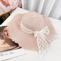 Pink wide-brim straw sun hat with elegant white lace ribbon and bow decoration - Pink Wavy (D-423)