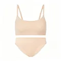 Detalle del conjunto de lencería beige sin costuras con sujetador de cuello redondo y braguita - XS / Color Piel
