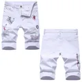 Slim fit white distressed denim shorts for men featuring graffiti print and ripped details - 38 / 2156# White