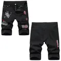 Slim fit black denim shorts for men featuring white and red graffiti prints and ripped details - 28 / 2157#